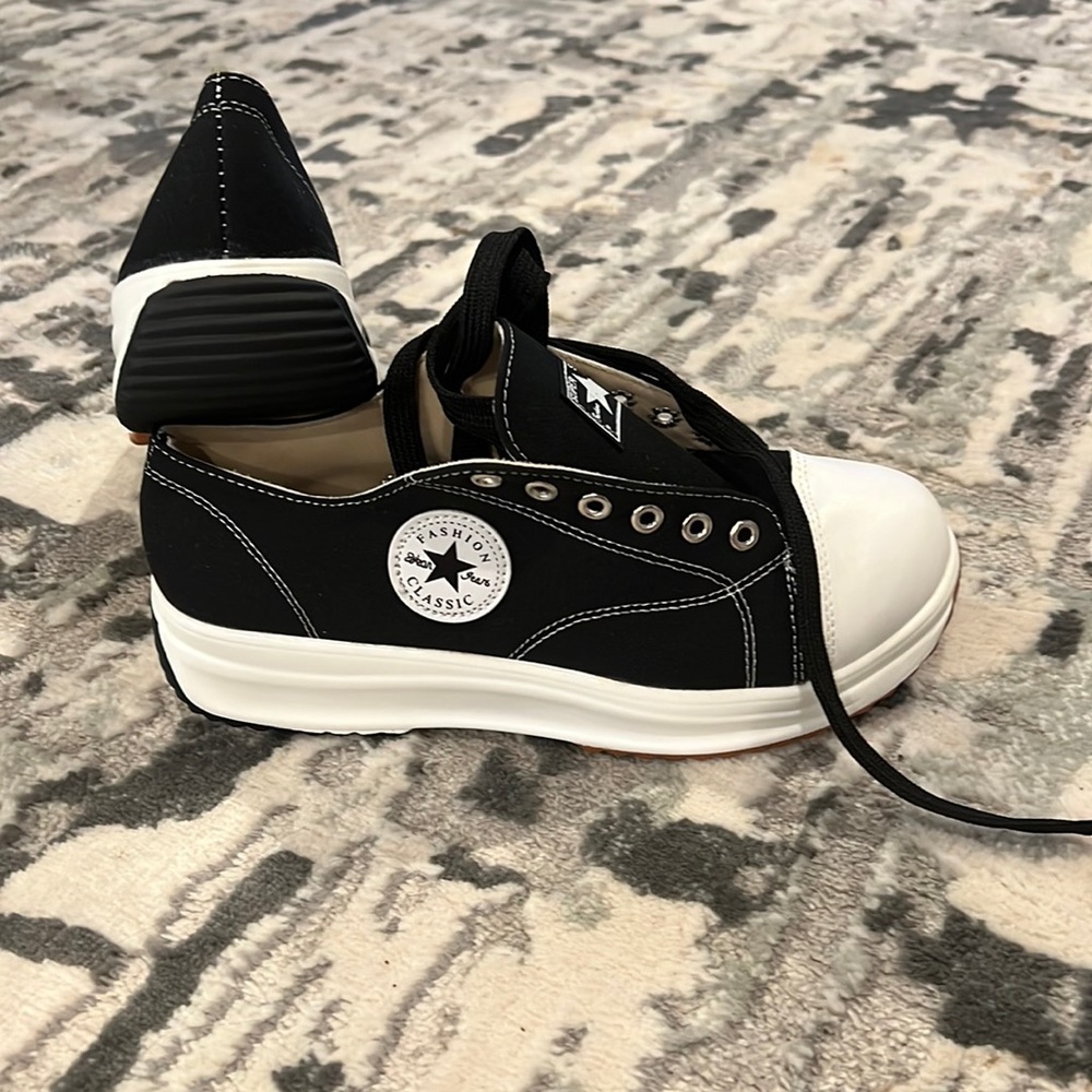 NWT. Never worn. Too small for me